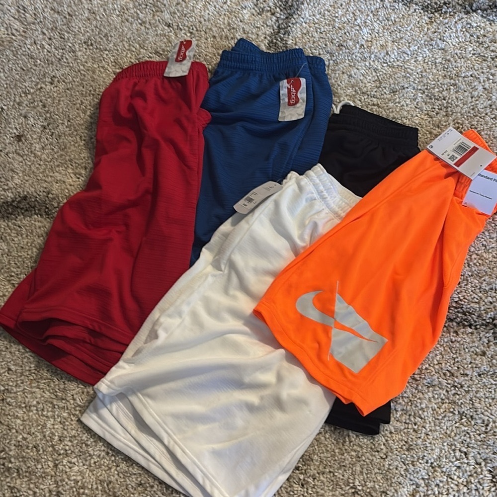 Boys size large shorts. Five pairs. Brand new with tags.